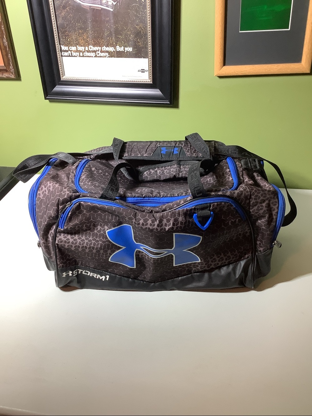 Under Armor Storm 1 black and blue duffle bag
